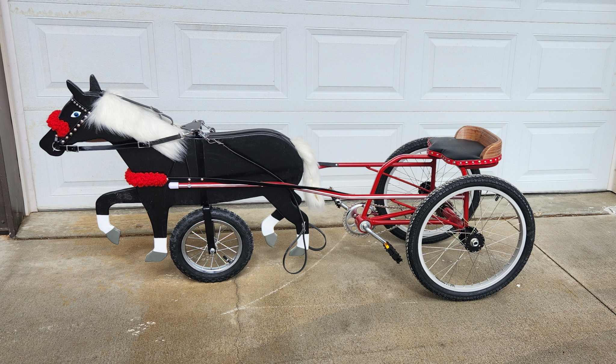 Handcrafted Pedal Pony Cart by Maynard Miller - Black and white pony with red cart